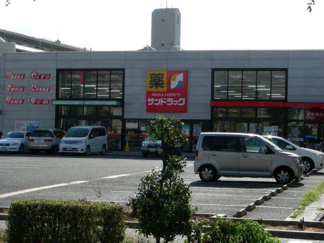 Drug store. San drag until Yokozutsumi shop 1123m