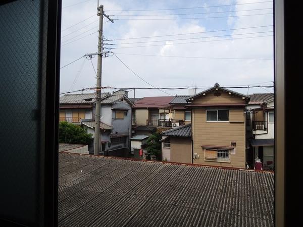 View photos from the dwelling unit. View from the second floor west side of. Back is one-story warehouse. Enter the good wind is Western-style 6 Pledge.