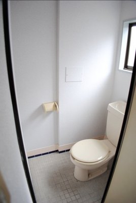 Toilet. Window with WC