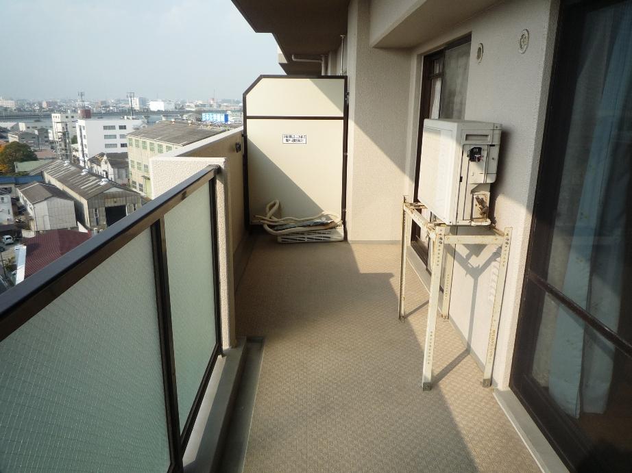 Balcony. It is to a balcony you can enter and exit from both living and Japanese-style room.