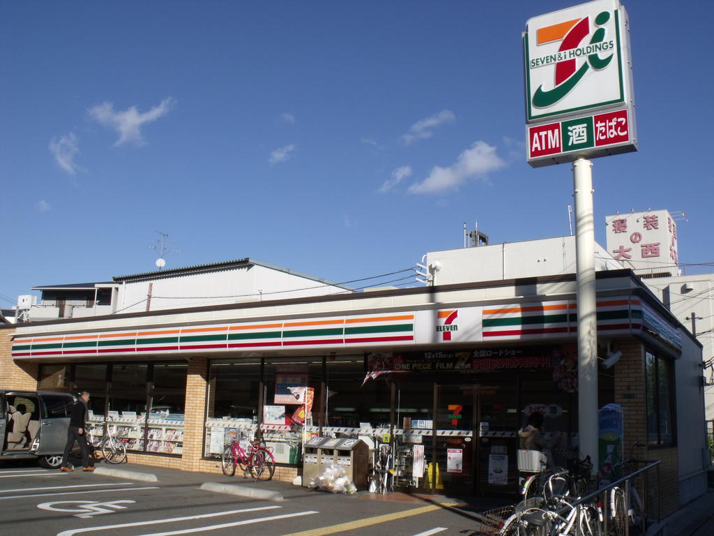 Convenience store. Seven-Eleven Osaka Higashimikuni 2-chome up (convenience store) 94m