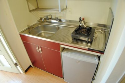 Kitchen. It is a kitchen with a refrigerator