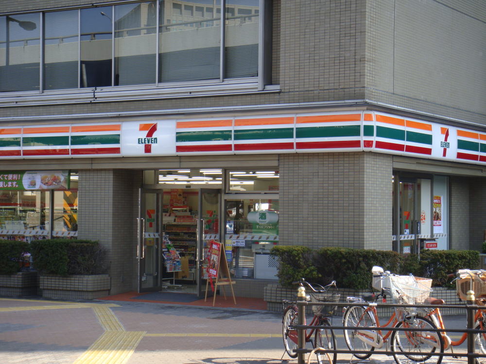 Convenience store. Seven-Eleven Osaka Higashimikuni 2-chome up (convenience store) 385m