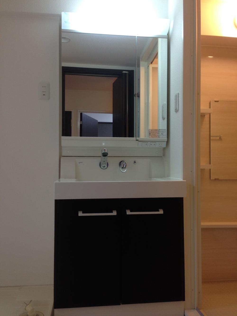 Wash basin, toilet. Bathroom vanity