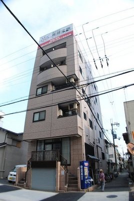 Building appearance. Station is also nearby convenient apartment