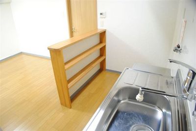 Kitchen. With storage shelves