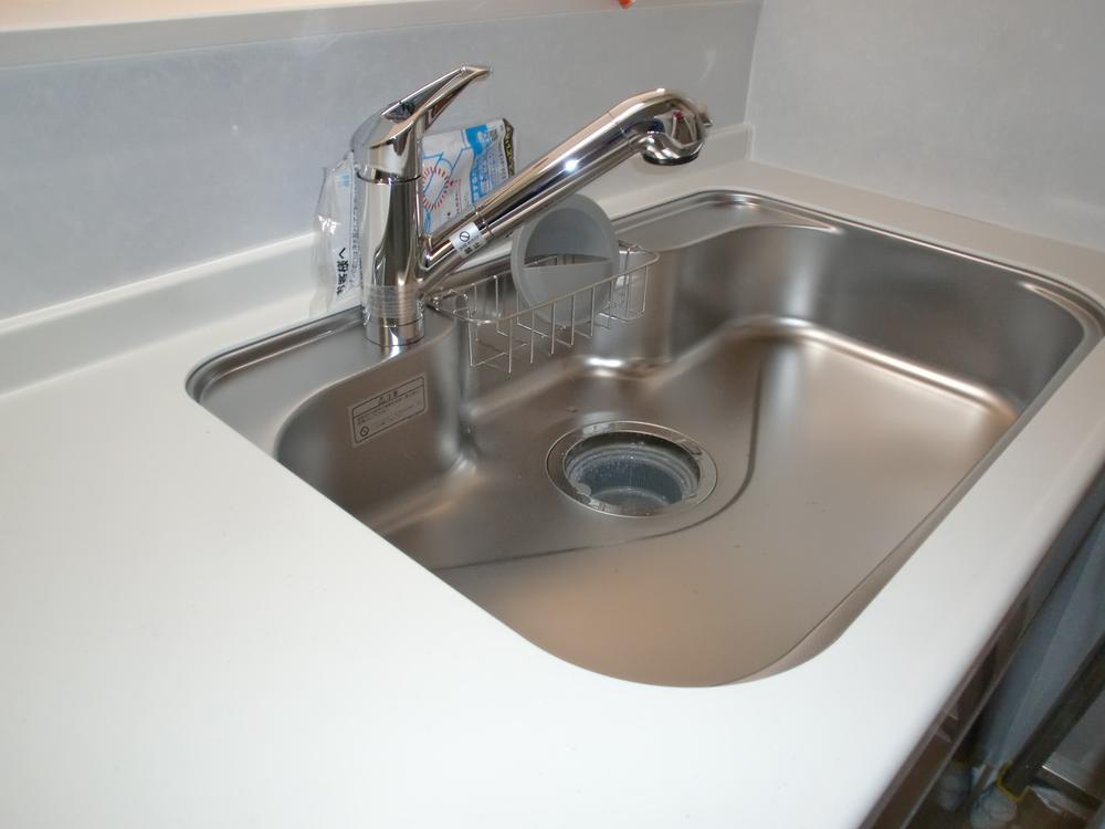 Kitchen. Washing is also a breeze in the spacious sink.