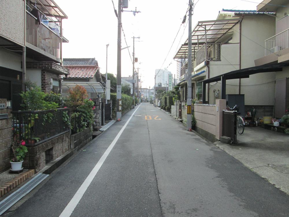 Local photos, including front road. A quiet residential area.