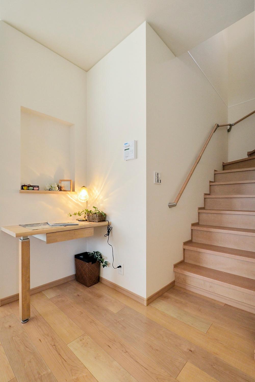 Living. Adopt a living-in stairs family of communication increases. The stairs next to, Also installed the available counter as study space and computer desk for children. (Model house)
