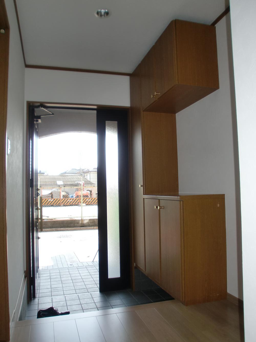 Entrance. Also spacious with storage space also ensure entrance. 