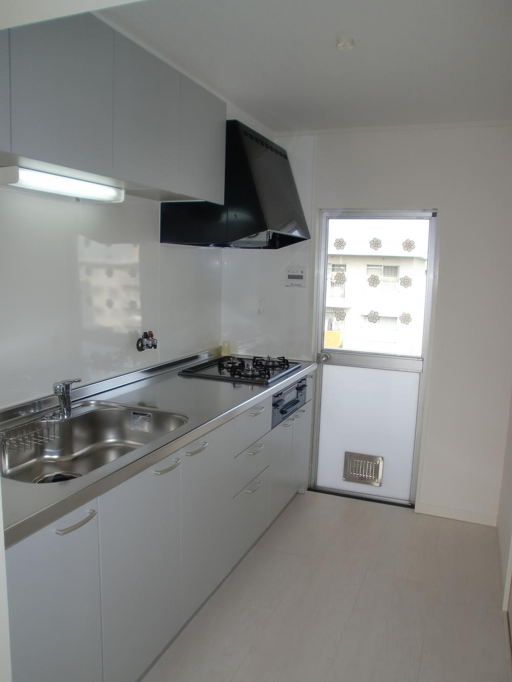 Kitchen. System kitchen had made Back door is also convenient and with
