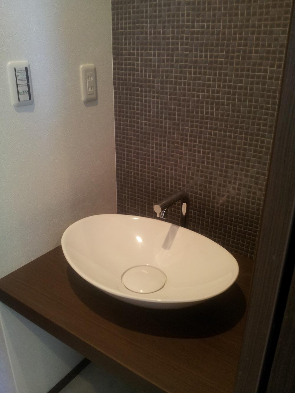 Wash basin, toilet. I tried to put a cute wash basin is on the second floor