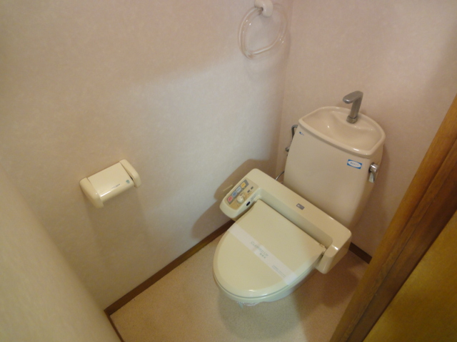 Toilet. Washlet is with