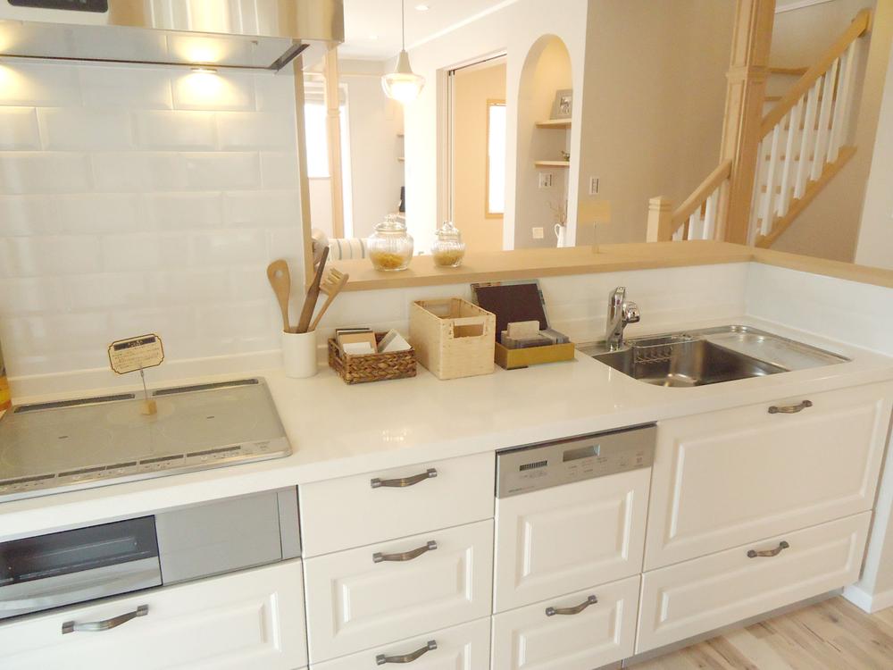 Model house photo. It is a model house of the kitchen that combines the functionality and design.