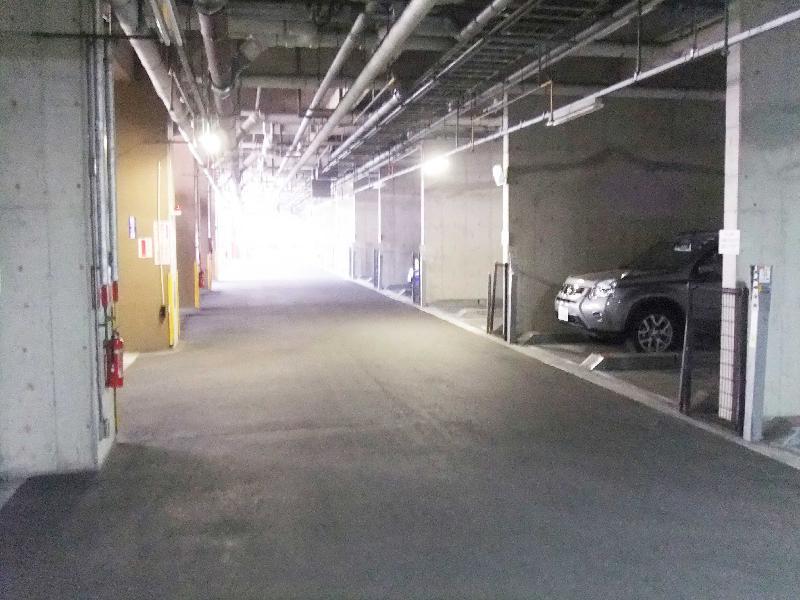 Parking lot. There in the basement, Since it goes up in the elevator to your room, Not wet even on rainy days.