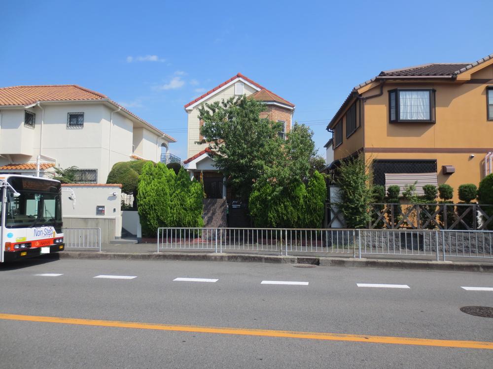 Local photos, including front road. It is conveniently located near the bus stop.