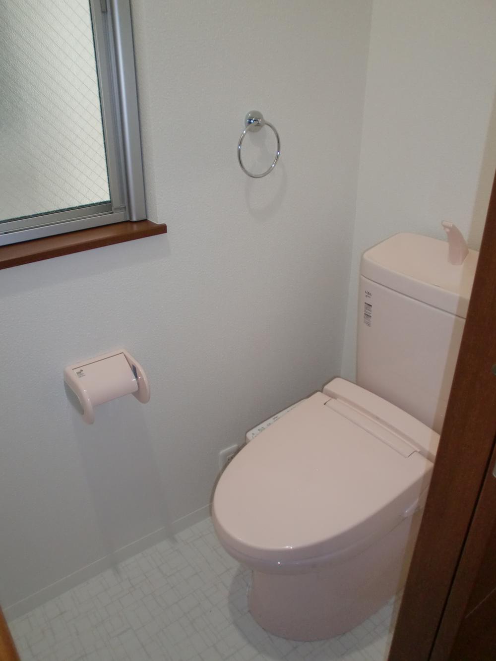 Toilet. It is a toilet with a clean.