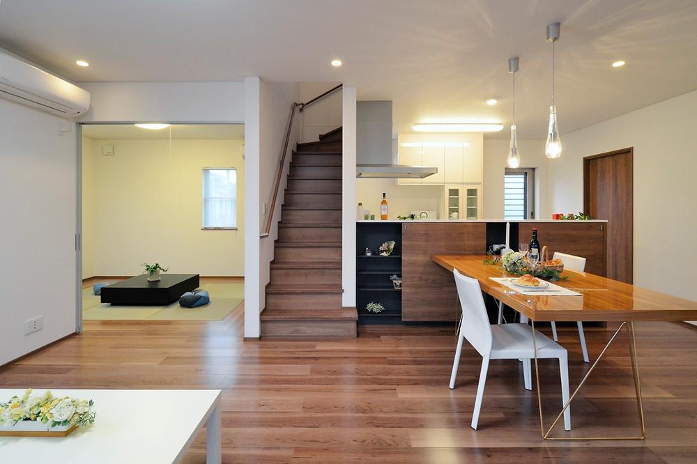 Living. Living which adopted the living-in stairs family of communication increases. And it has a space to come together nature and family. (Local model house)