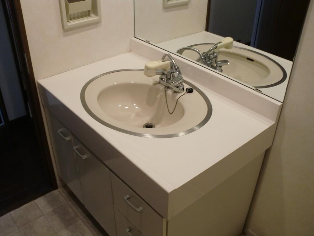 Wash basin, toilet. It has become a big vanity mirror