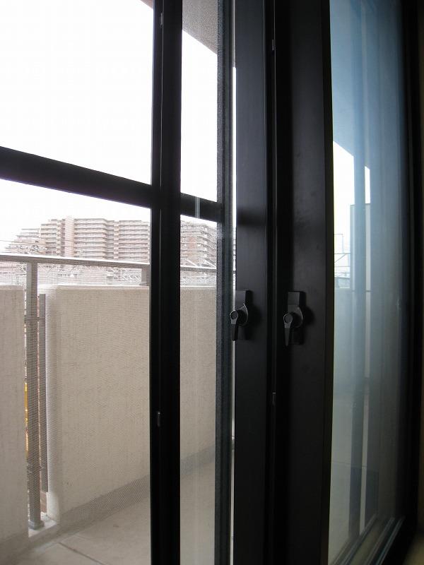 Other. Sweeping windows facing the balcony noise measures a double door