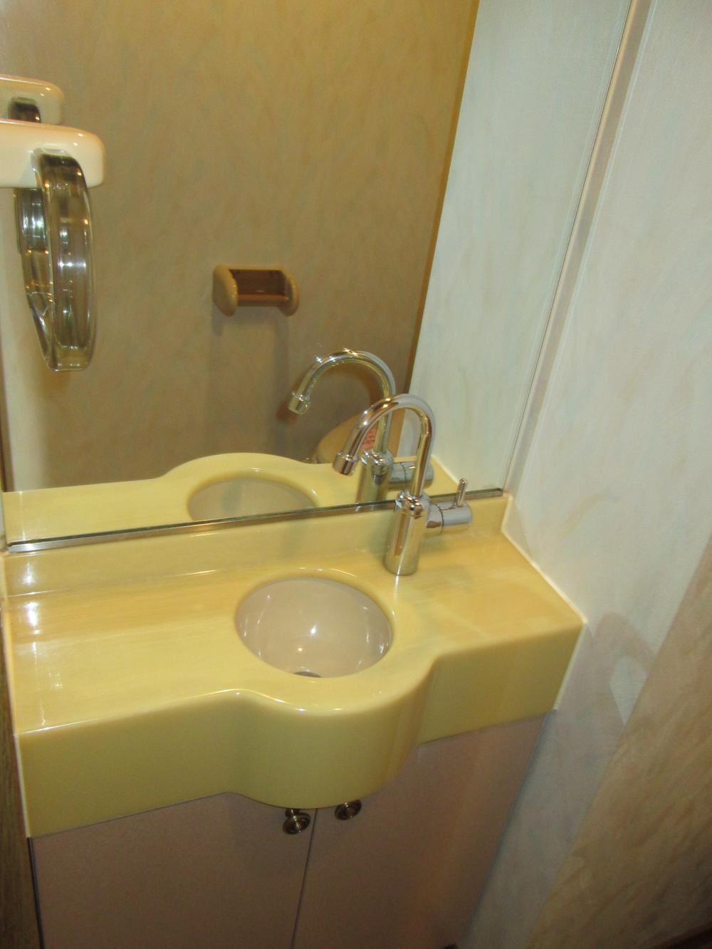 Toilet. The toilet There is also a hand-washing space.