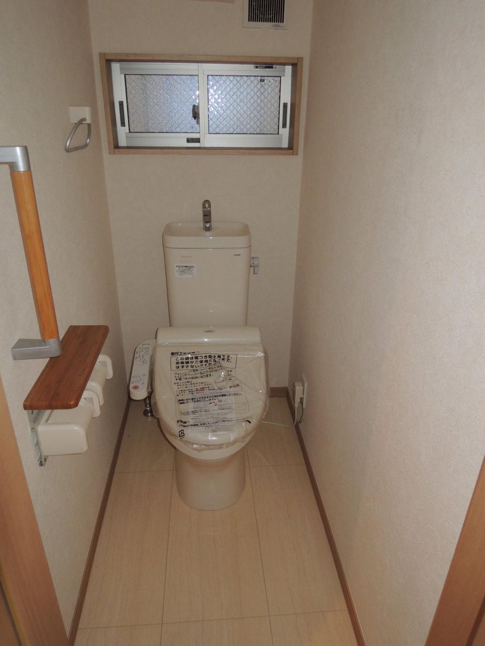 Toilet. In with warm water washing toilet seat, It is a toilet with a clean.