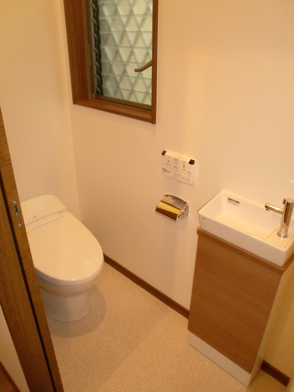Toilet. It is also spacious and toilet.