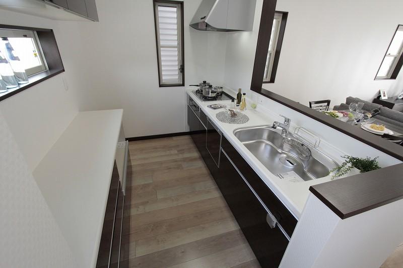 Kitchen.  [Model House: Living]  Easy-to-use system Kitchen! It is very bright kitchen have windows also behind. Because good ventilation does not muffled even smell!