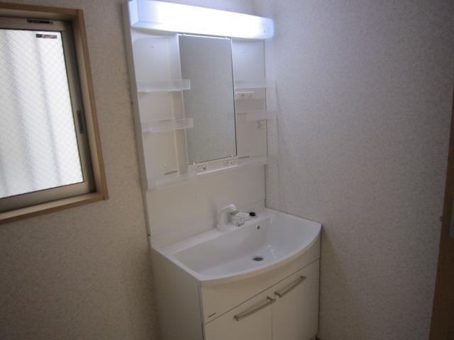 Wash basin, toilet. Shooting from the room