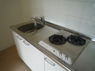 Kitchen. Two-burner gas system kitchen! Sink is also a spacious! 