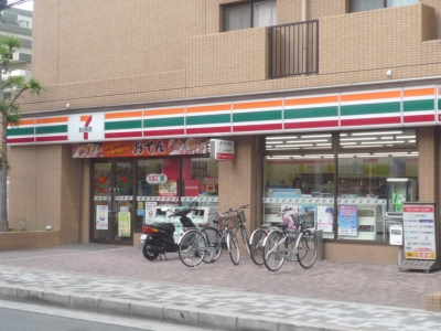 Convenience store. Seven-Eleven Suita Esaka-cho 2-chome up (convenience store) 490m