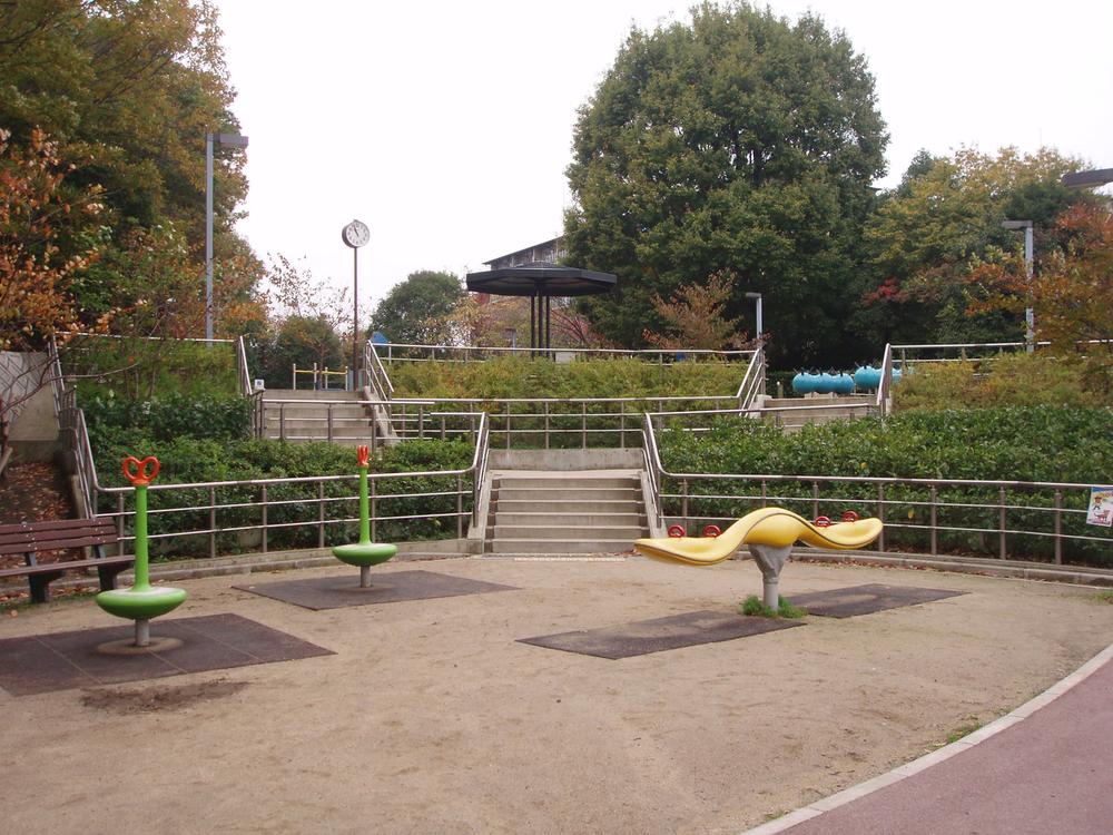 Other. Park adjacent to the apartment is crowded with a happy laughter of children