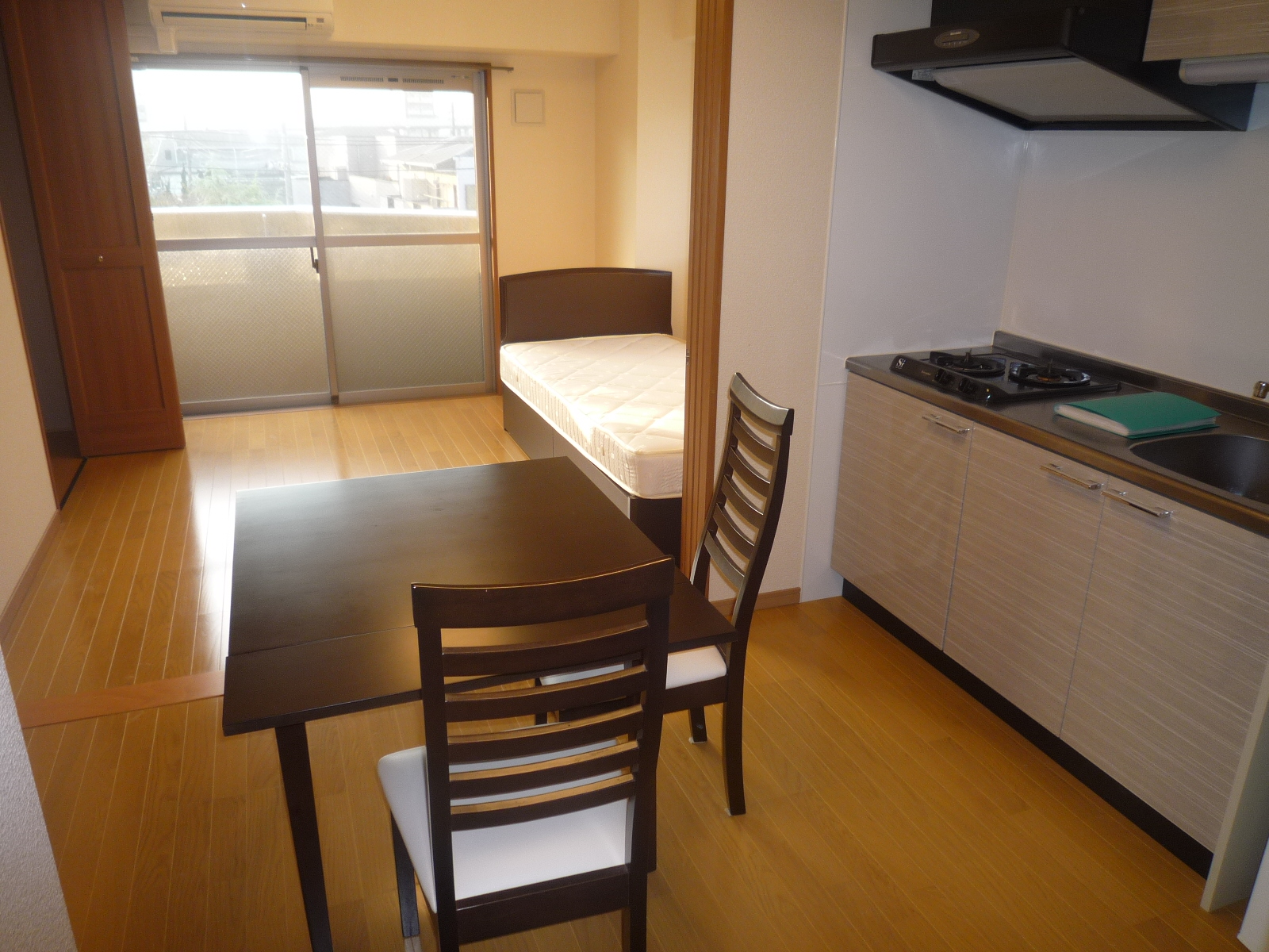 Other room space. Dining space is also spacious. Model is room.