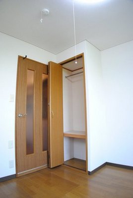 Living and room. Storage that has been divided into upper and lower