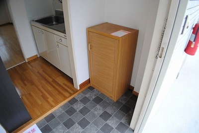 Entrance. With cupboard