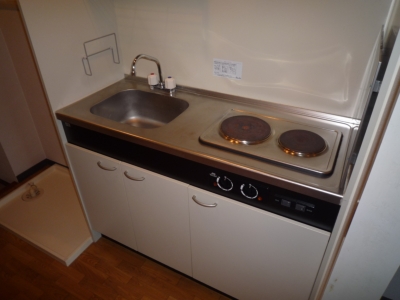 Kitchen. It is a two-burner stove in the kitchen! 