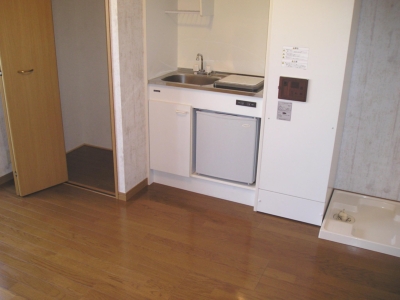 Kitchen. Fridge to see! Also equipped with indoor laundry bread!