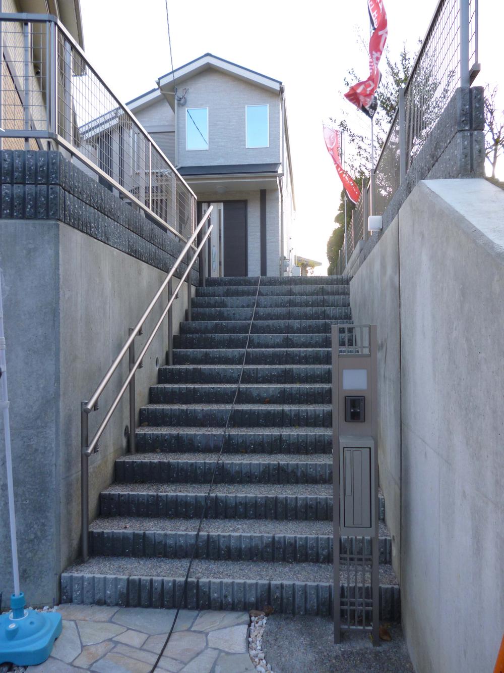 Local appearance photo. Stairs from the parking lot