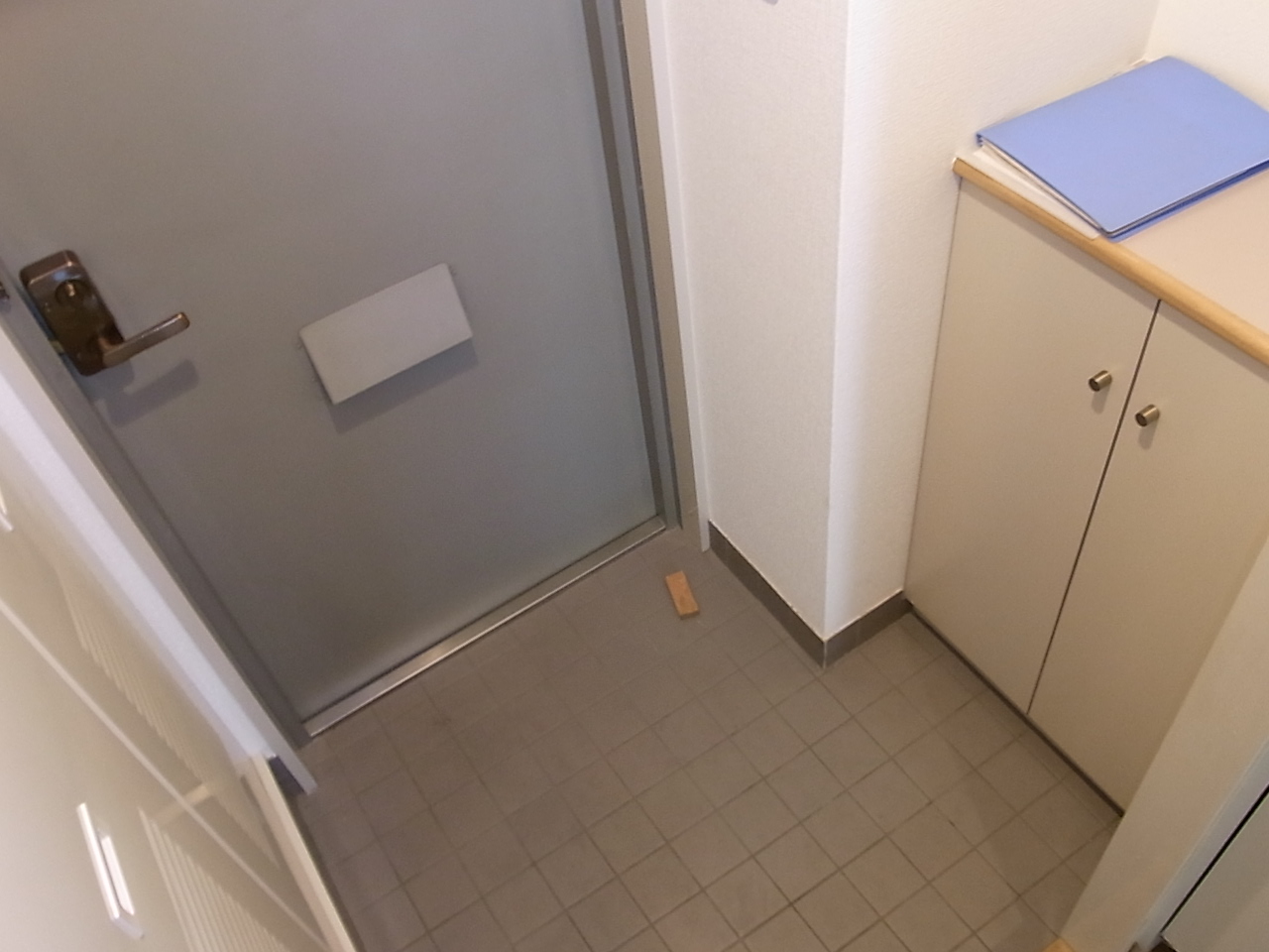 Entrance. With a shoe box