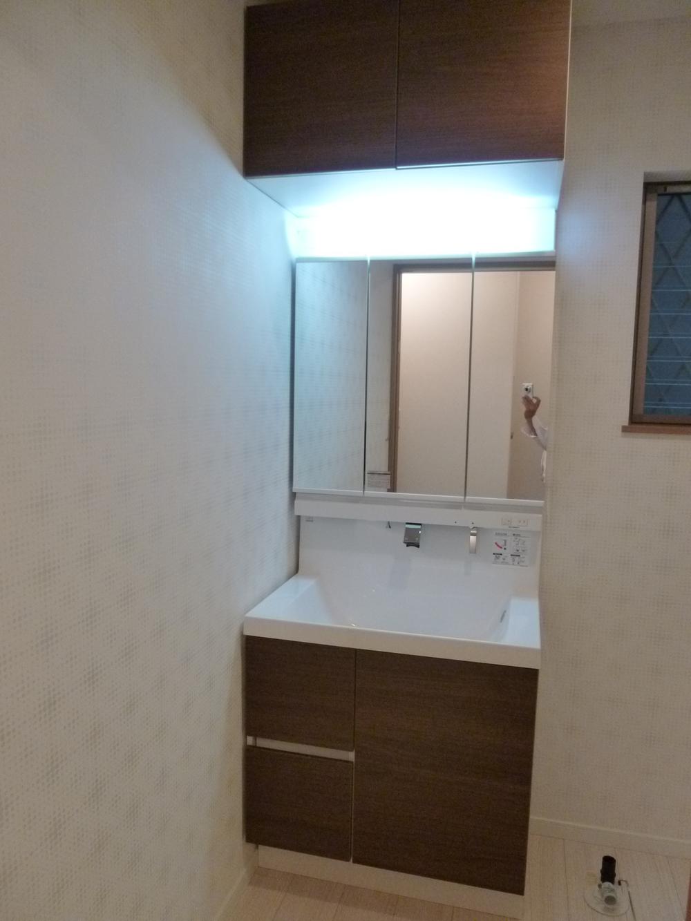 Wash basin, toilet. With upper closet