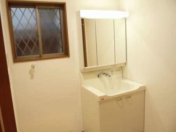 Wash basin, toilet. Bathroom vanity