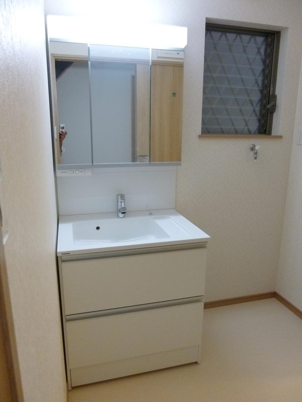 Wash basin, toilet. Bathroom vanity