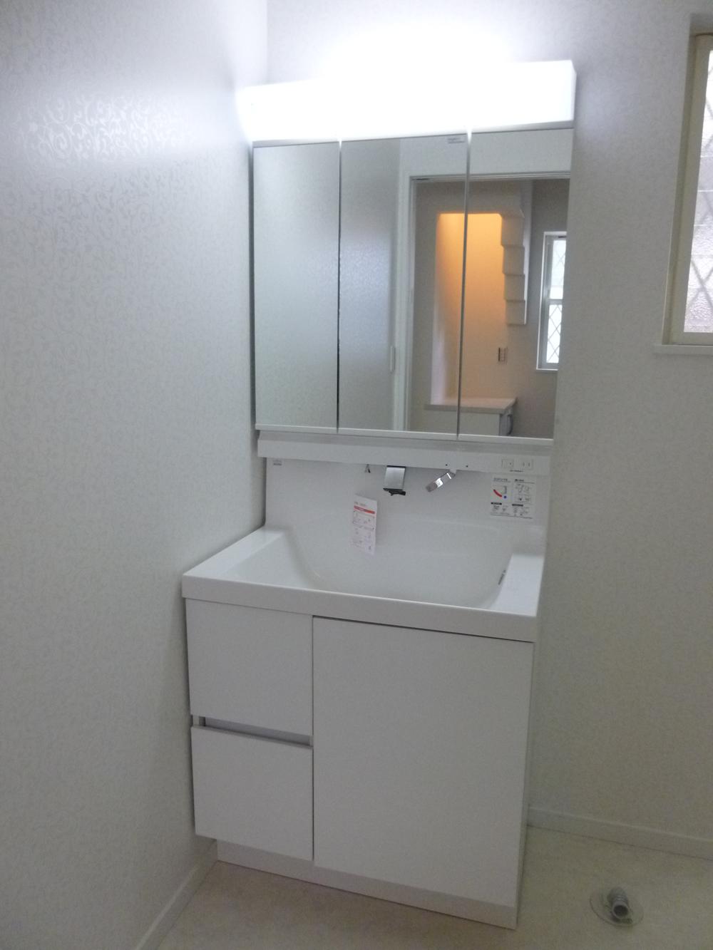 Wash basin, toilet. Bathroom vanity