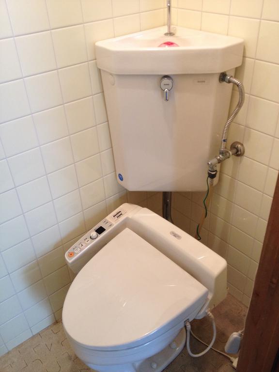 Toilet. It is with a bidet. 