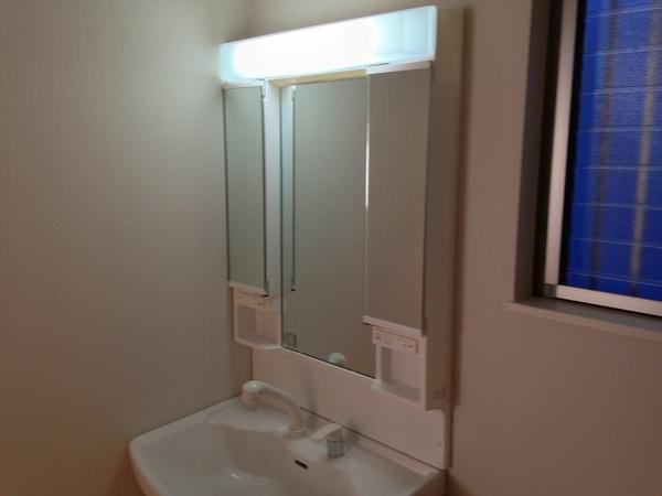 Wash basin, toilet. Wash room is clean in the vanity of the storage lot