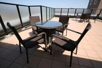 Balcony. Day for the southeast corner lot is the best.