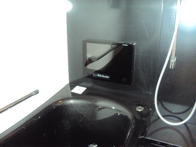 Bathroom. ■ Bathroom TV, A standard feature ■