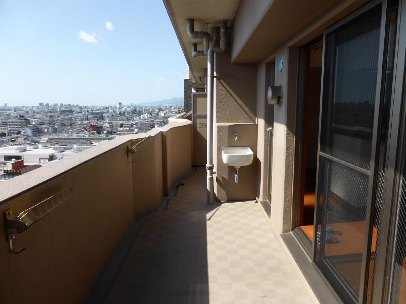 Balcony. There is a slop sink in the spread of the balcony