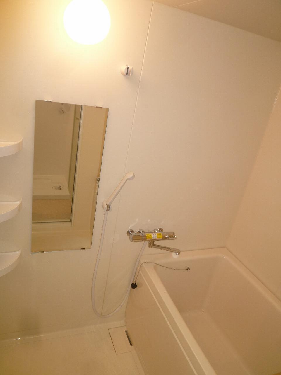 Bathroom.  ・ We bathtub had made  ・ It had made thermo shower faucet  ・ We had made corner shelf
