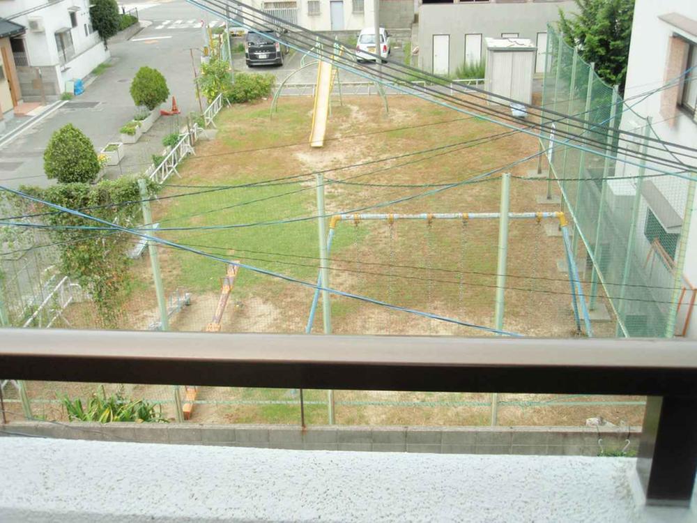View photos from the dwelling unit. It is a short park beside visible from the balcony.